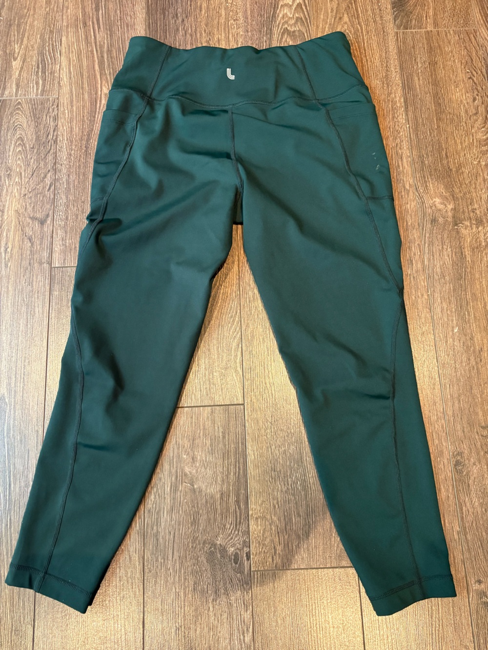 Lolë Women’s Leggings Size L – Dark Green – Athletic/Workout with Pockets.